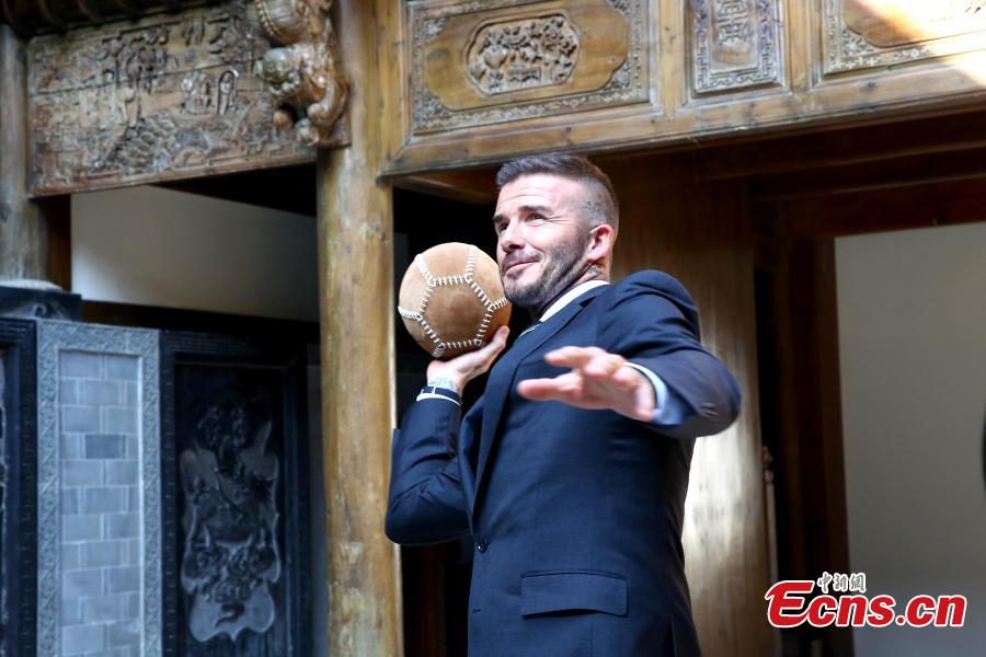 Beckham tries ancient football in China