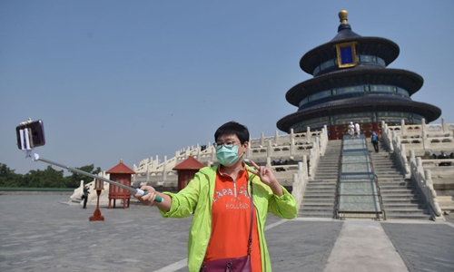  Beijing tourism hit by sudden COVID-19 spike 