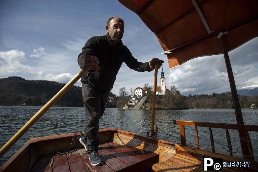 Bruised by coronavirus, Slovenian boatmen restore pletna for tourist comeback