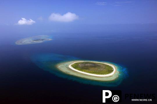  Military issues warning on meddling in South China Sea