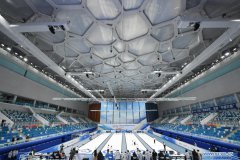 Athletes compete during curling test program at National Aquatics Center in Beijing