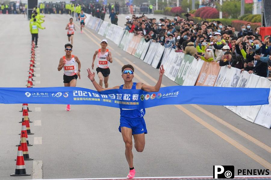 Zhang, Peng clinch Olympic slots with victories at Xuzhou Marathon