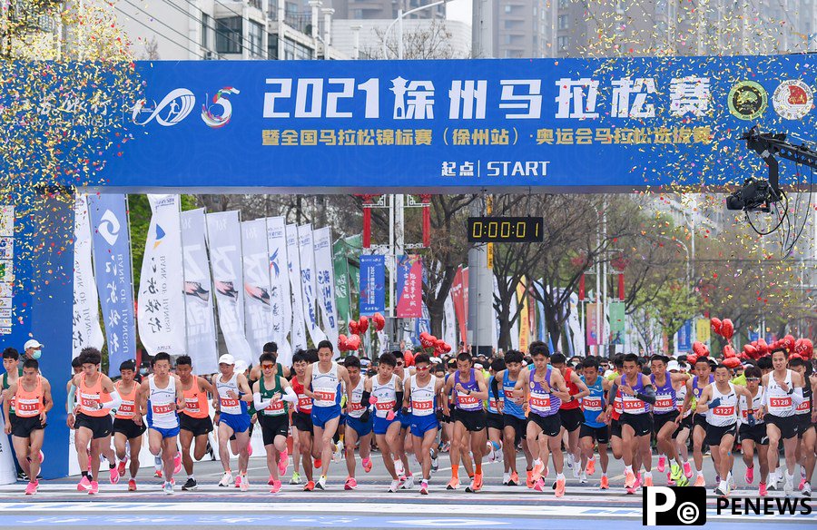 Zhang, Peng clinch Olympic slots with victories at Xuzhou Marathon