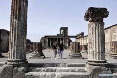 People visit Archaeological Park of Pompeii in Italy