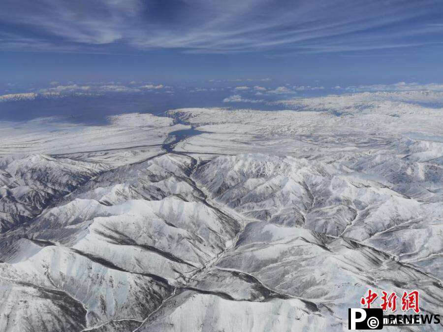 Snow blankets Qilian Mountains in early summer