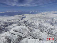 Snow blankets Qilian Mountains in early summer
