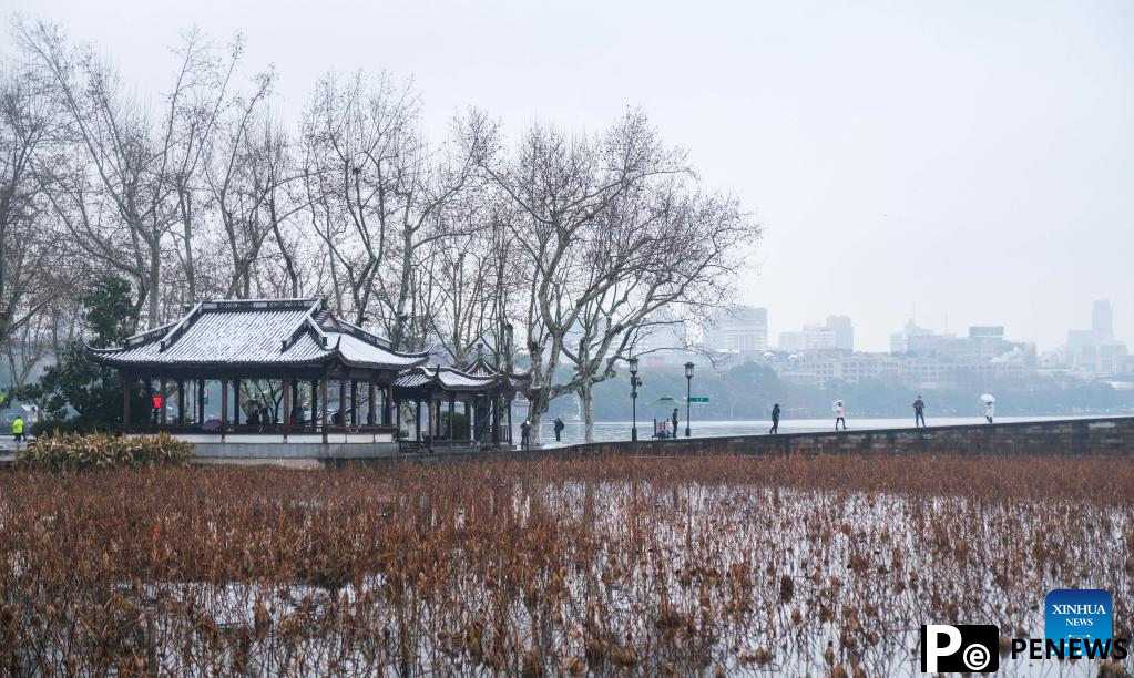 In pics: snow scenery of West Lake