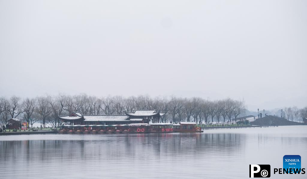 In pics: snow scenery of West Lake