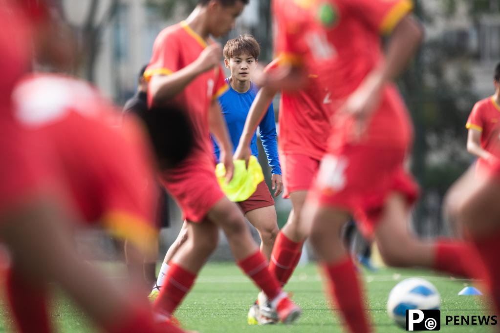 Chinese female football player Wang Shuang attends training session