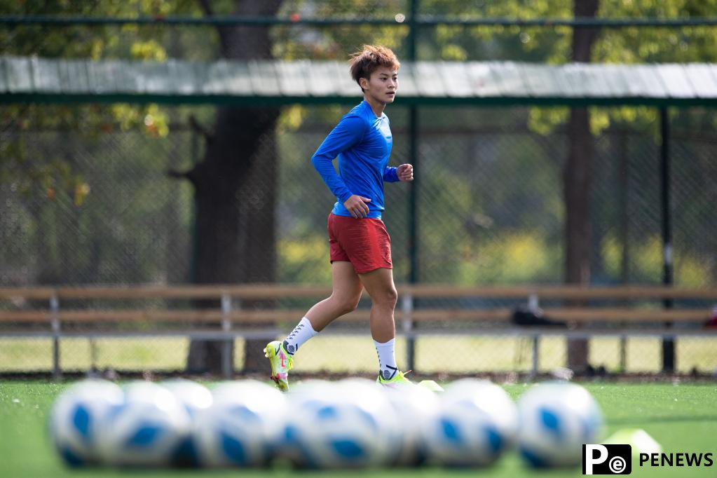 Chinese female football player Wang Shuang attends training session