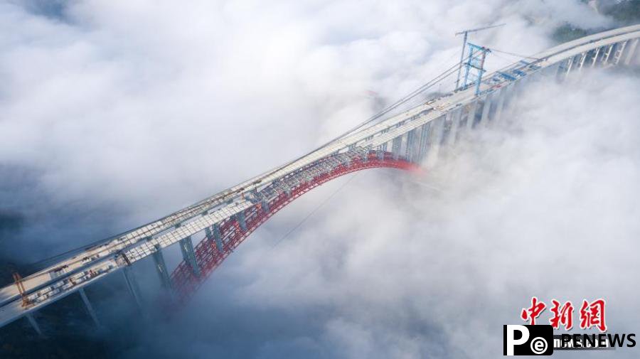 Spectacular view of Dafaqu grand bridge above clouds