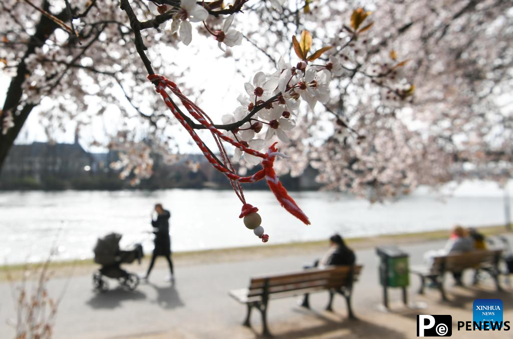 People enjoy spring time in Frankfurt, Germany