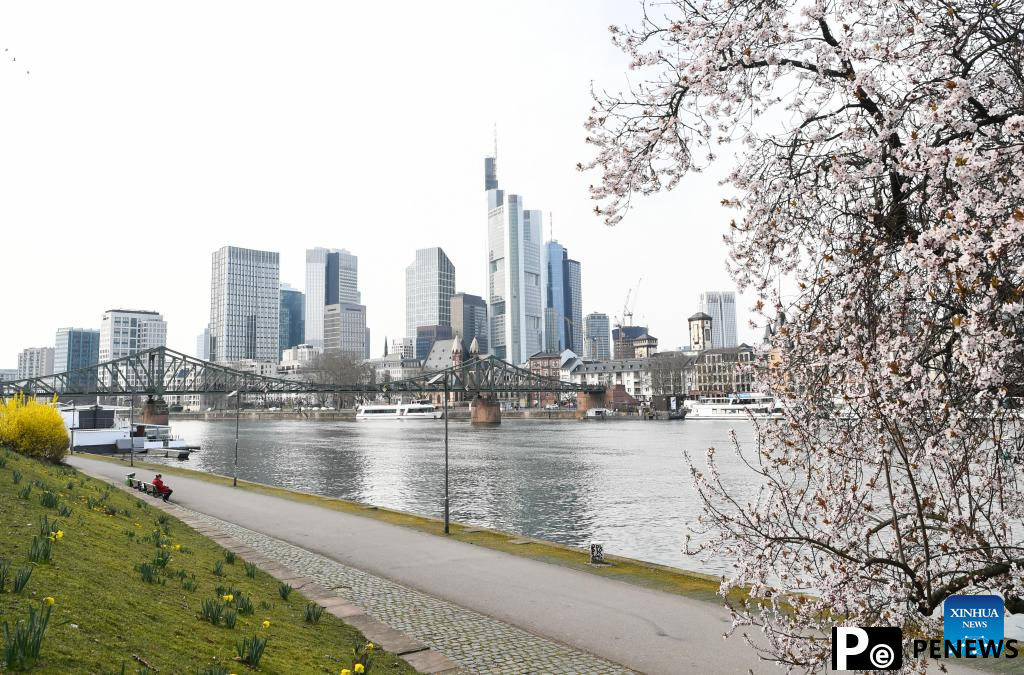 People enjoy spring time in Frankfurt, Germany