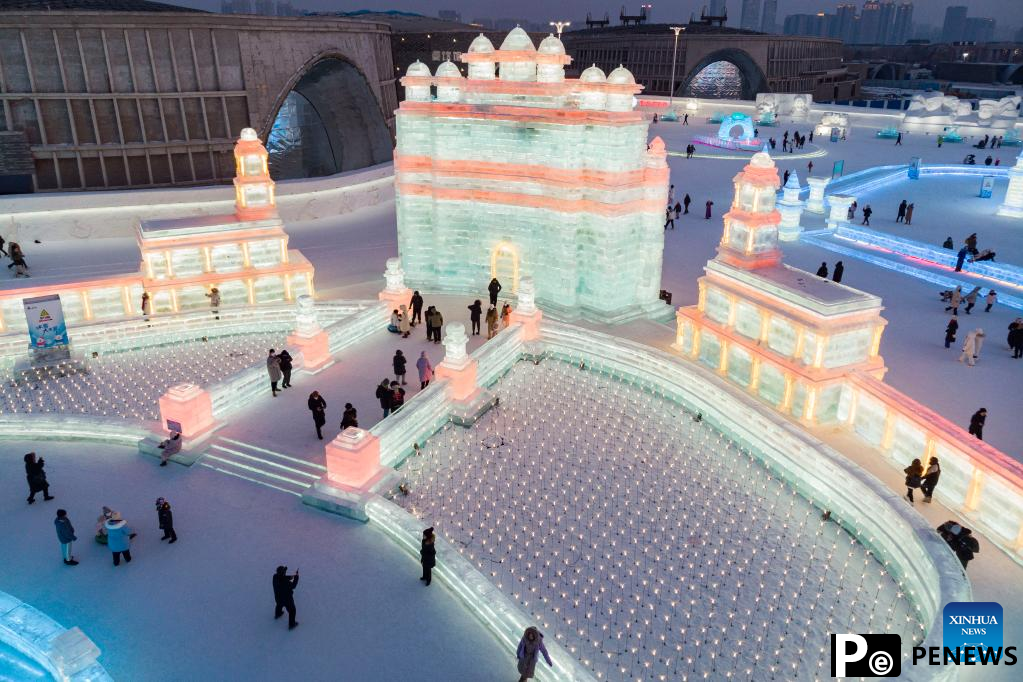 People visit Ice-Snow World theme park in Harbin, northeast China