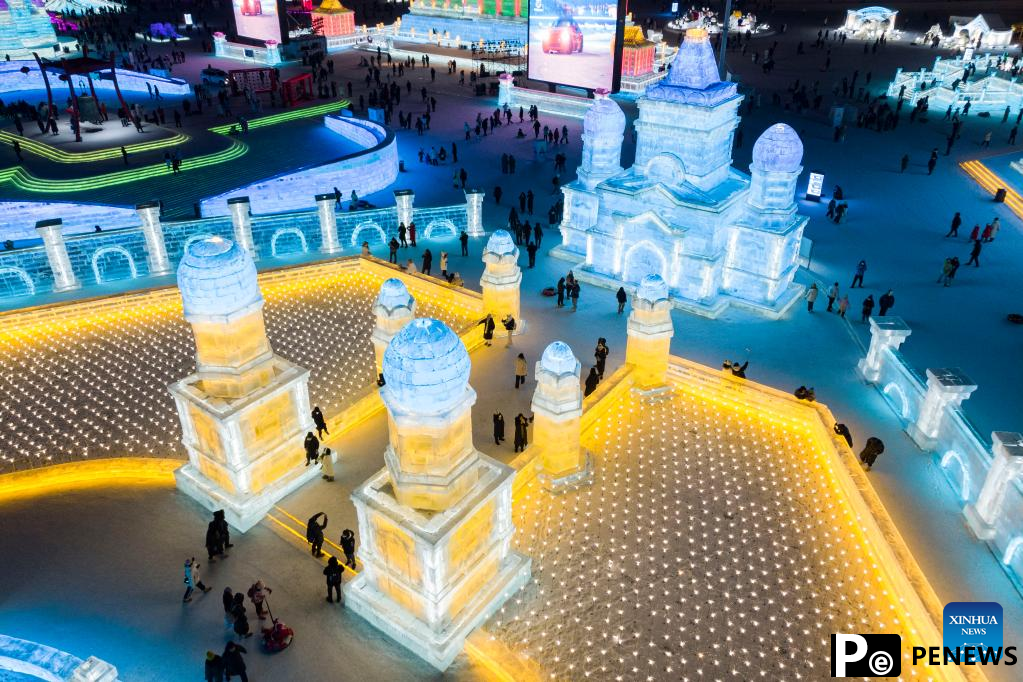 People visit Ice-Snow World theme park in Harbin, northeast China