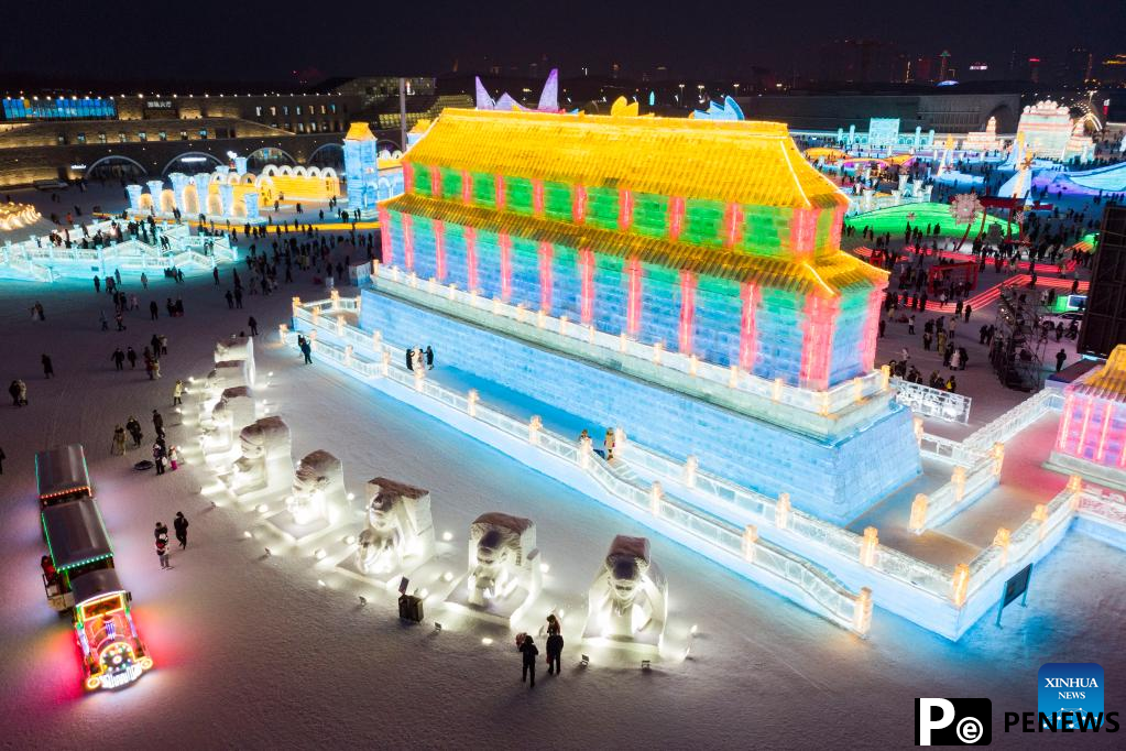 People visit Ice-Snow World theme park in Harbin, northeast China