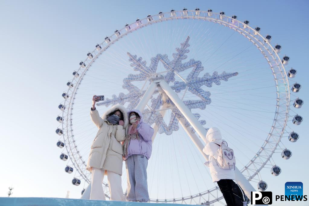 People enjoy themselves at Harbin Ice and Snow World