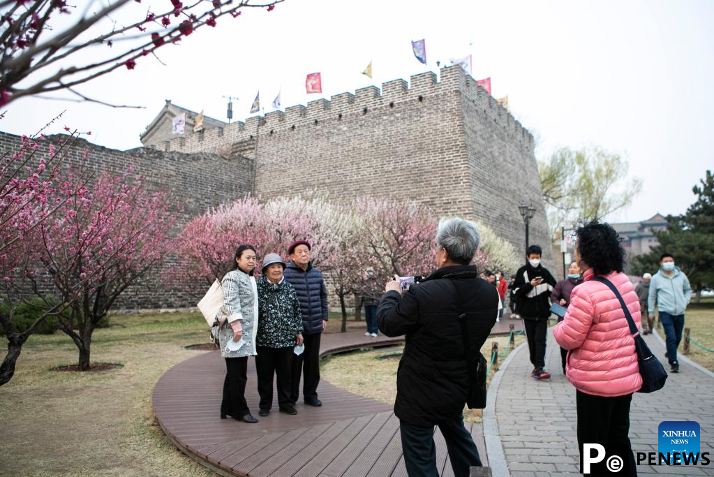 Blooming flowers attract tourists to Ming City Wall Site Park in Beijing