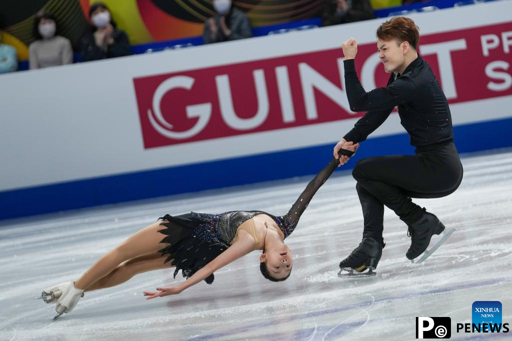 In pics: pairs short program at ISU World Figure Skating Championships