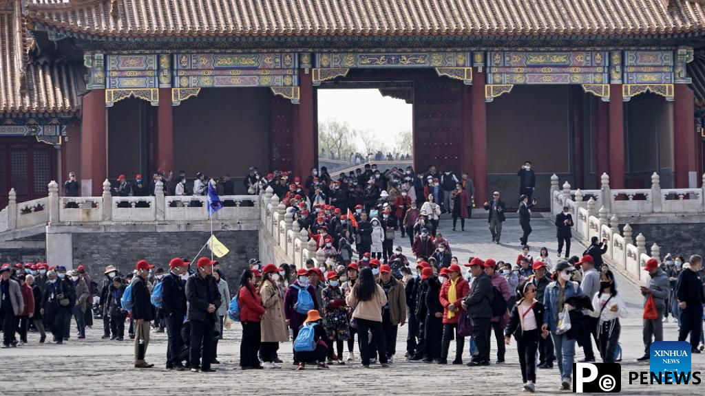 Tourists visit Palace Museum in Beijing