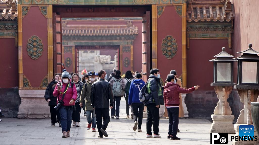 Tourists visit Palace Museum in Beijing