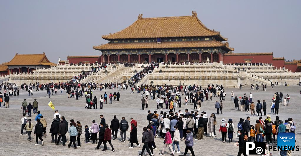 Tourists visit Palace Museum in Beijing