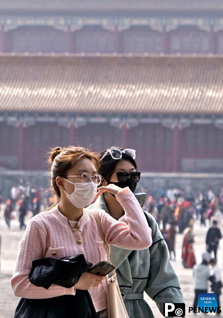 Tourists visit Palace Museum in Beijing