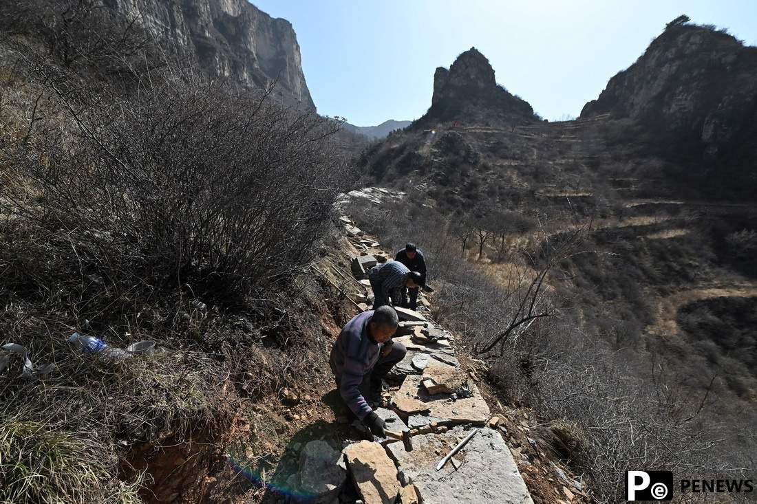 Villagers build roads to prosperity in N China