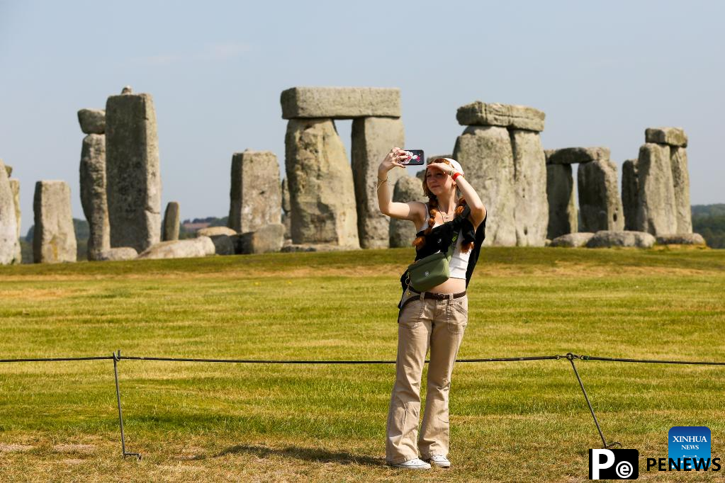 People visit Stonehenge in Amesbury, Britain