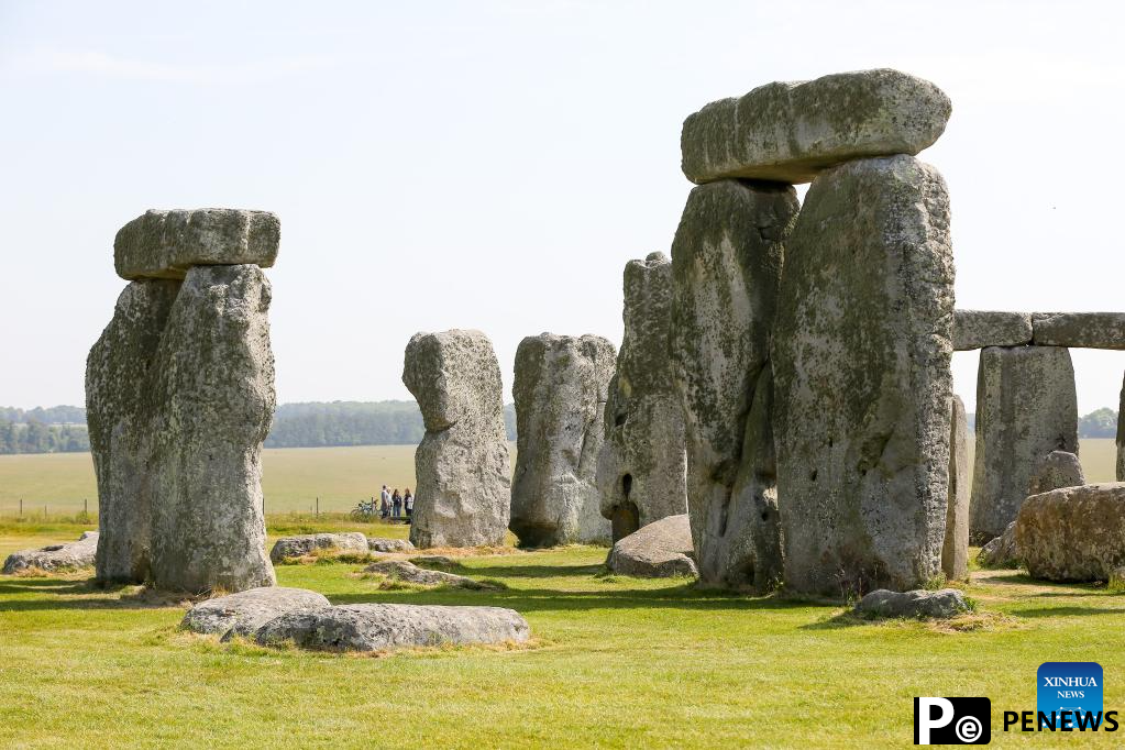 People visit Stonehenge in Amesbury, Britain