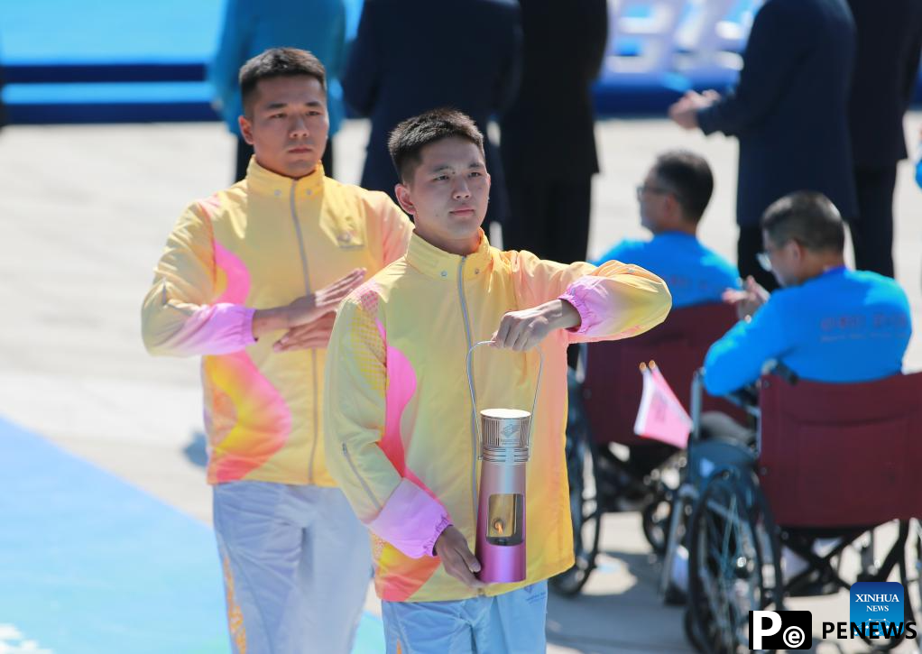 In pics: flame retrieval ceremony of torch relay of 4th Asian Para Games in Hangzhou