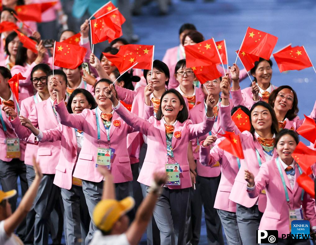 Delegations parade into stadium during opening ceremony of 4th Asian Para Games in Hangzhou