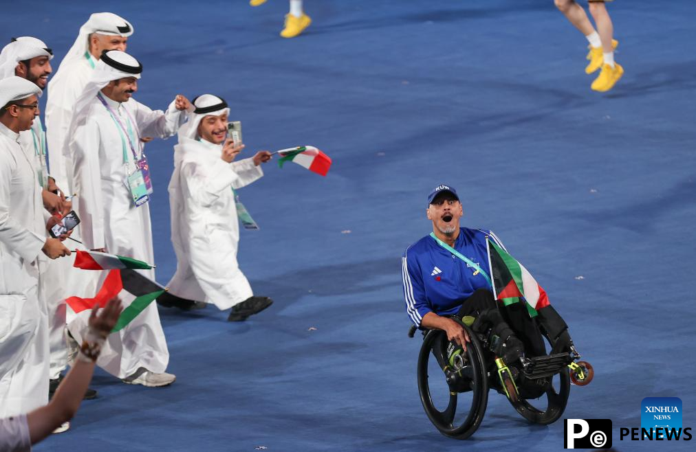 Delegations parade into stadium during opening ceremony of 4th Asian Para Games in Hangzhou