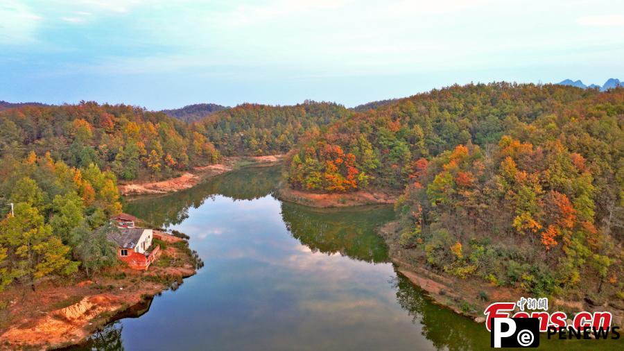 Reservoir, colorful forest create stunning landscape in Sichuan