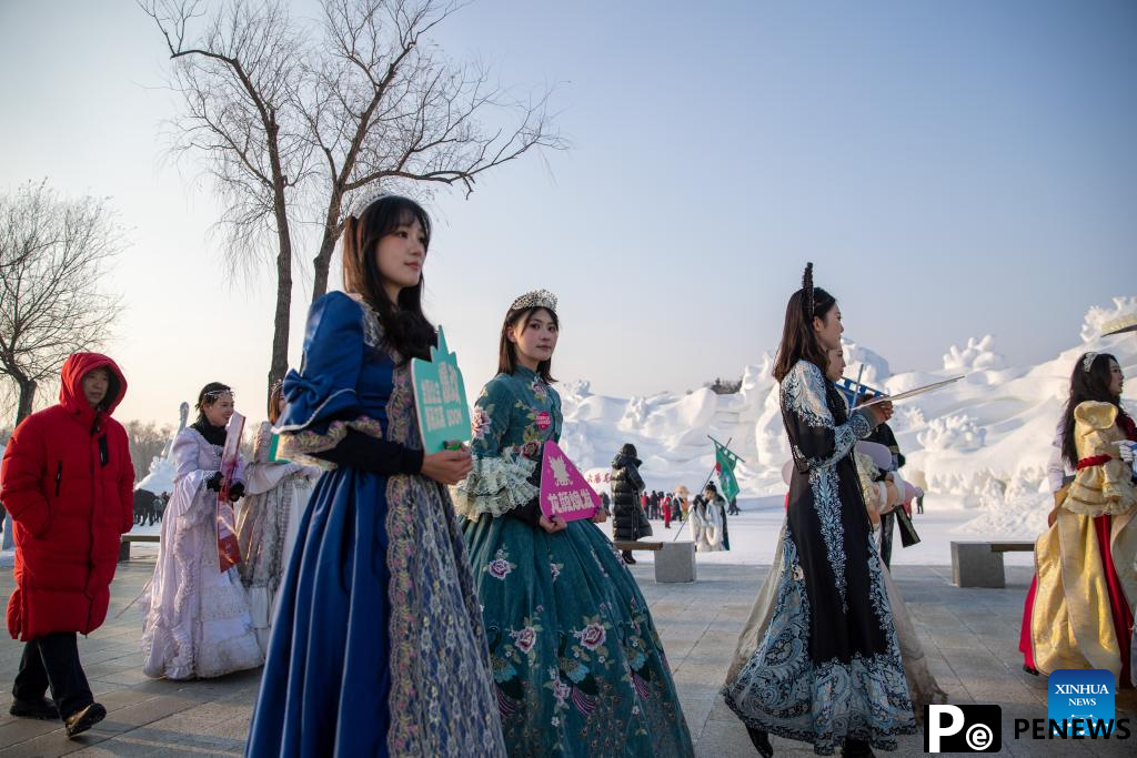 In pics: costume parade at Sun Island scenic spot in Harbin, NE China