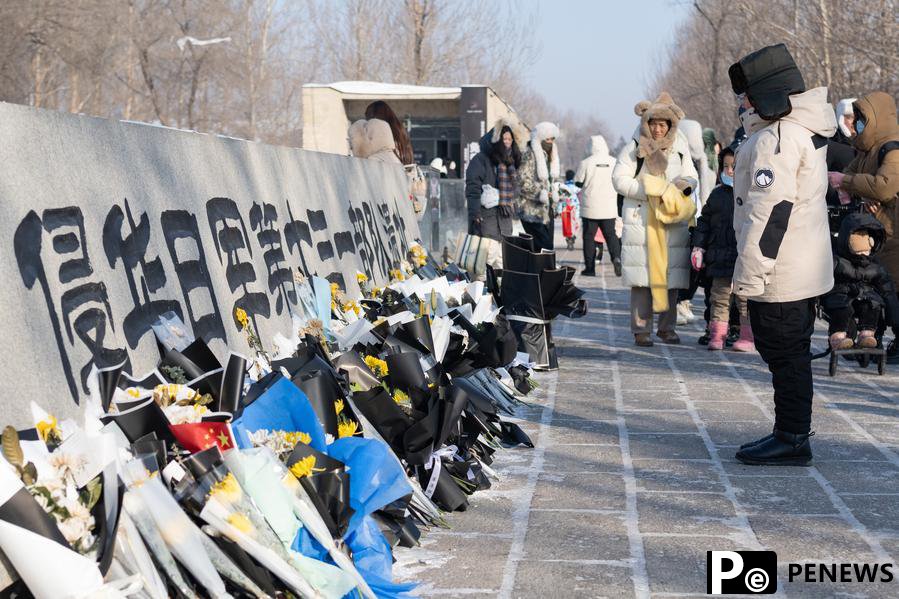 In Harbin's icy embrace, tourists flock to offer condolences, cherish memories