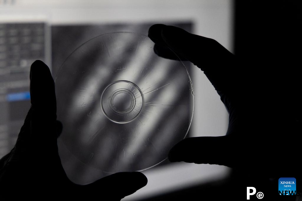 Researchers develop optical disk memory with petabit capacity in China