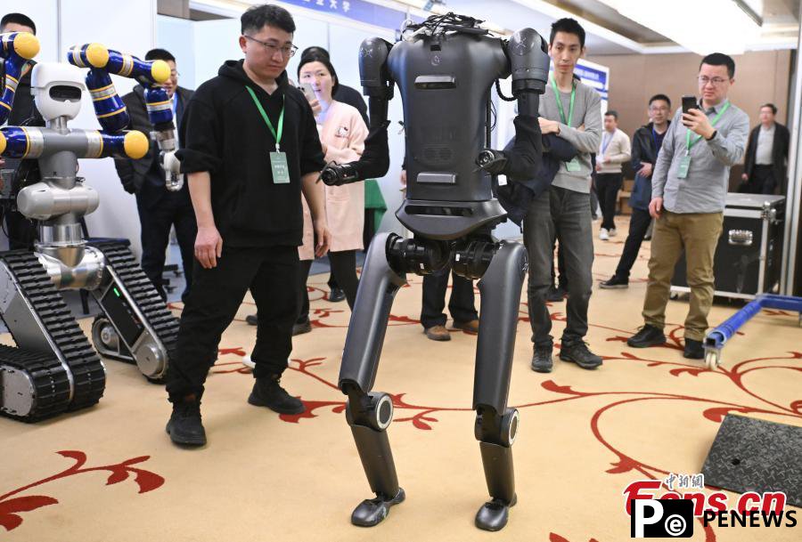 Humanoid robot competition in Beijing draws visitors