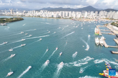 Yachts ride waves in Sanya, China's Hainan