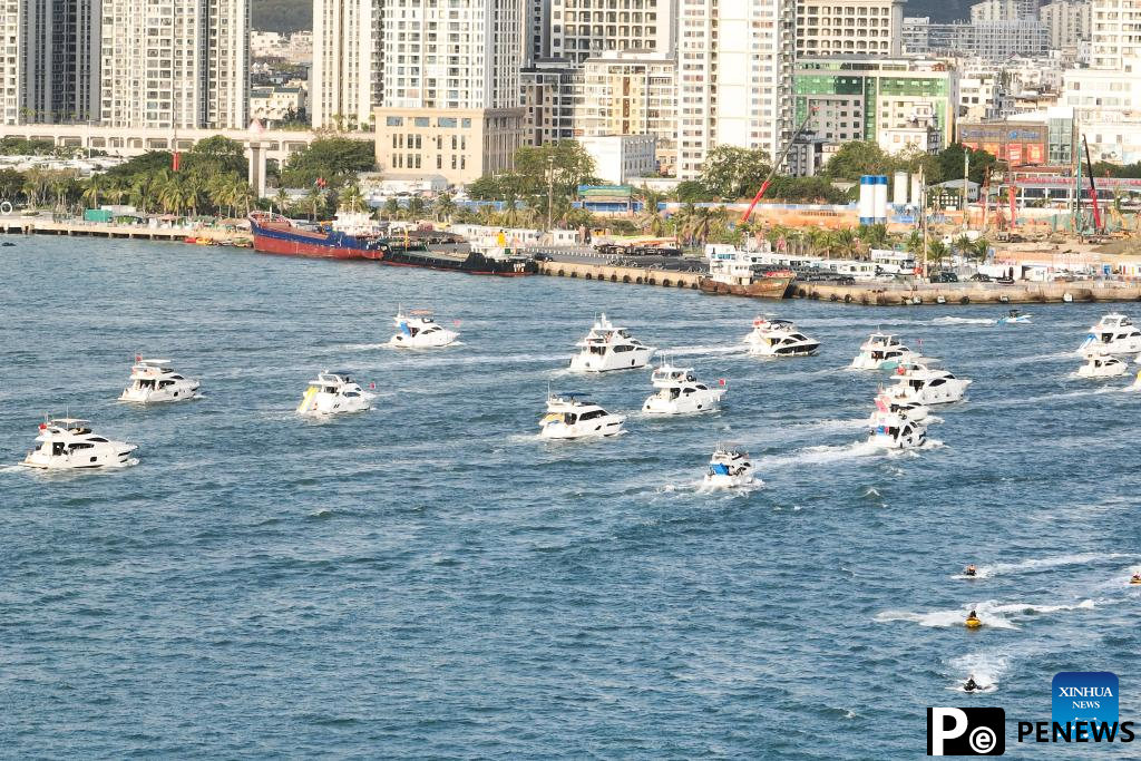 Yachts ride waves in Sanya, China