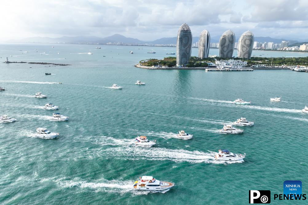 Yachts ride waves in Sanya, China