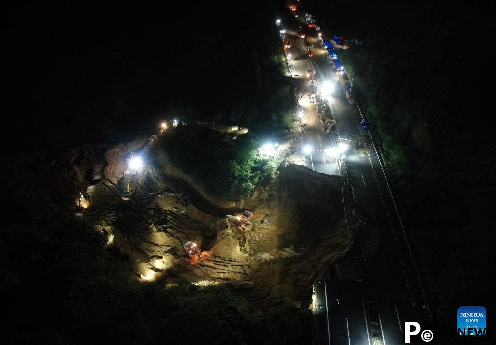 Rescue work continues after road collapse in S China