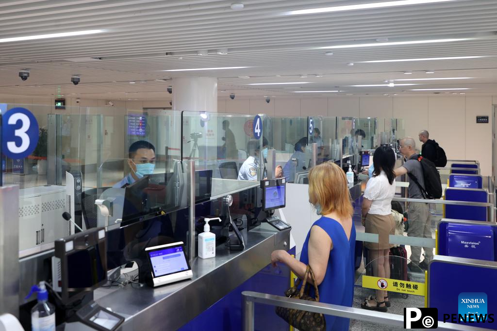 Foreign tourists enter China