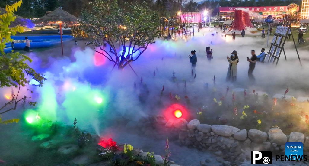 Tourists enjoy themselves during May Day holiday across China