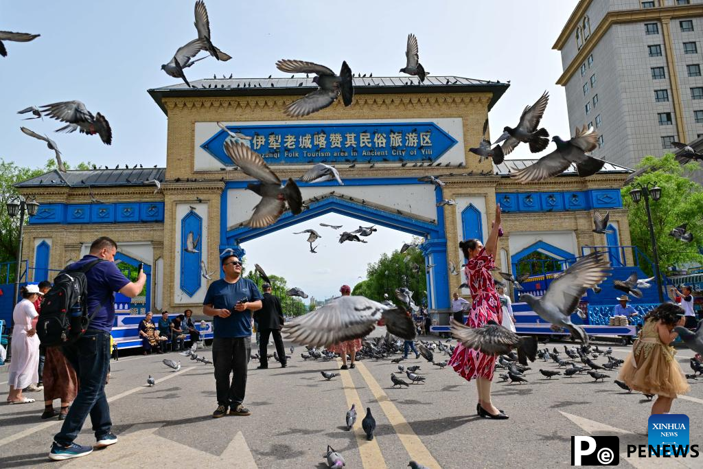 Xinjiang attracts tourists during summer