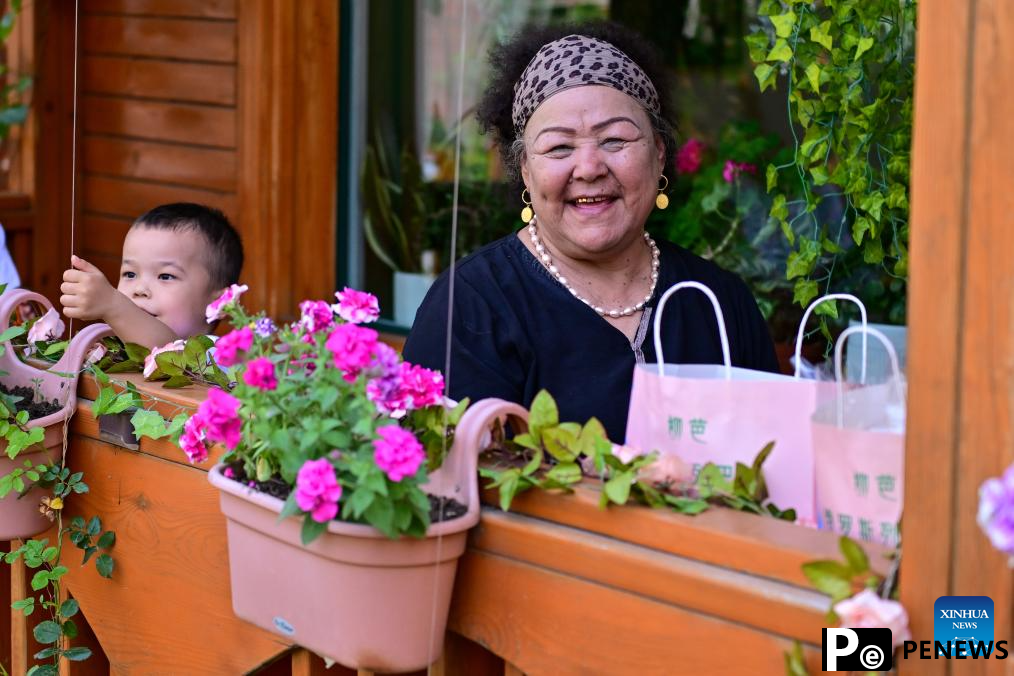 Xinjiang attracts tourists during summer