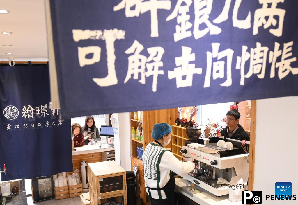 People enjoy leisure time in Cangqiao Straight Street in Shaoxing, China