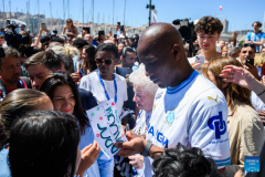 Olympic torch relay completes first day in France, Drogba lights cauldron