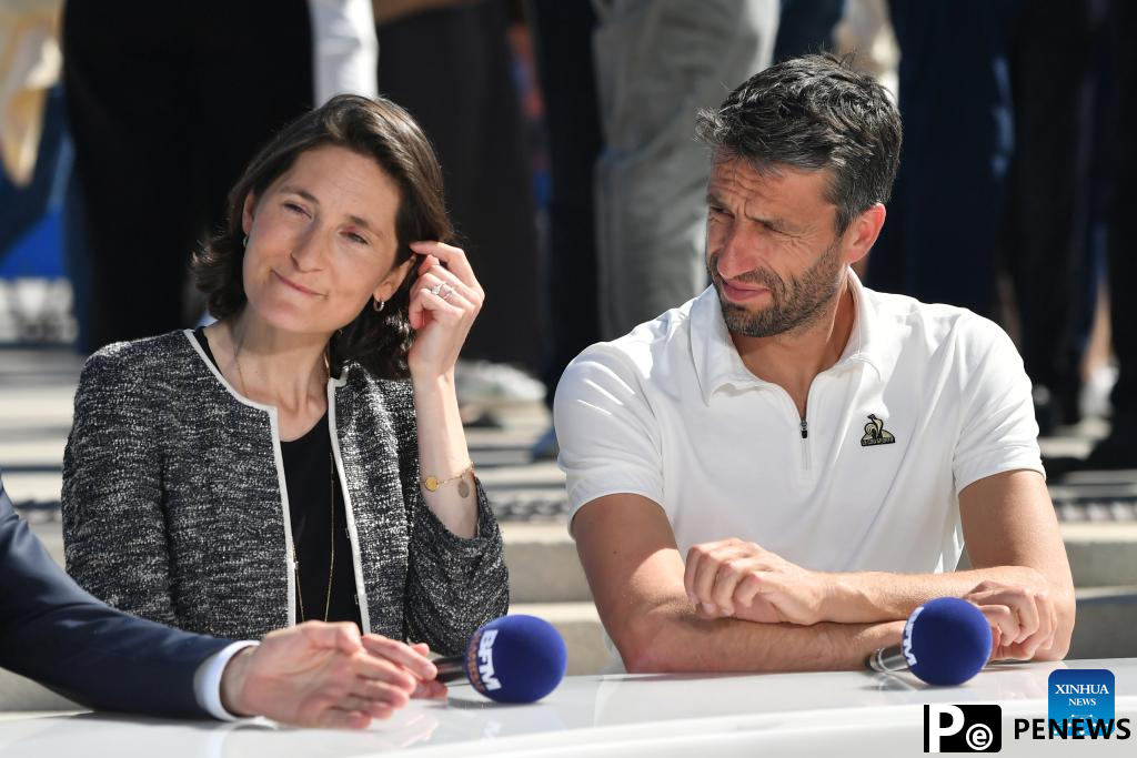 Olympic torch relay completes first day in France, Drogba lights cauldron