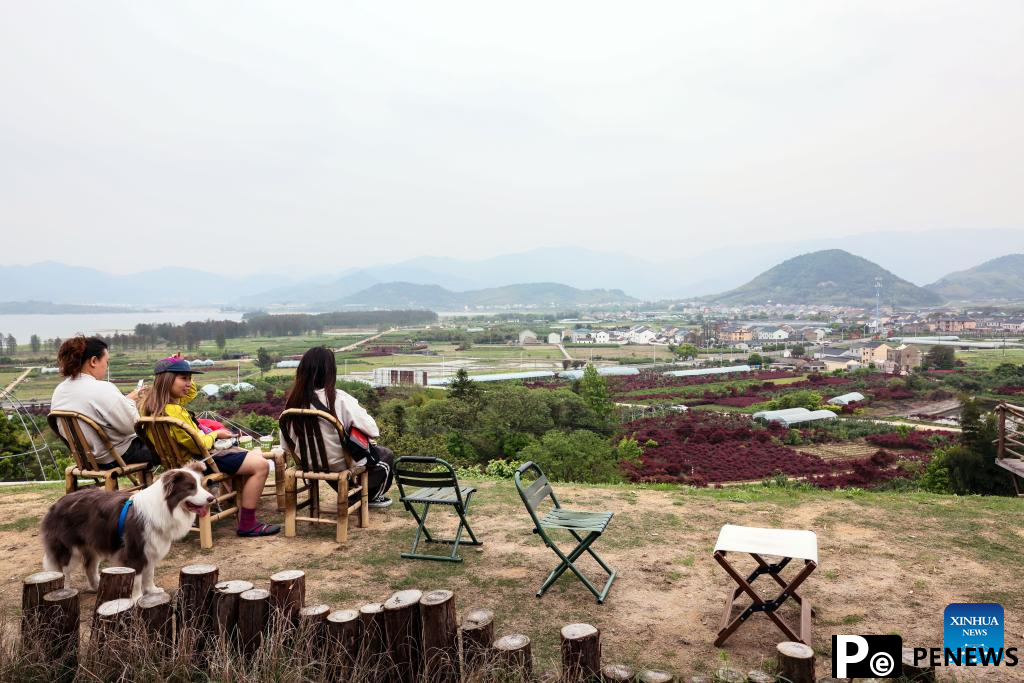 Young entrepreneur promotes high quality growth of agritourism in China